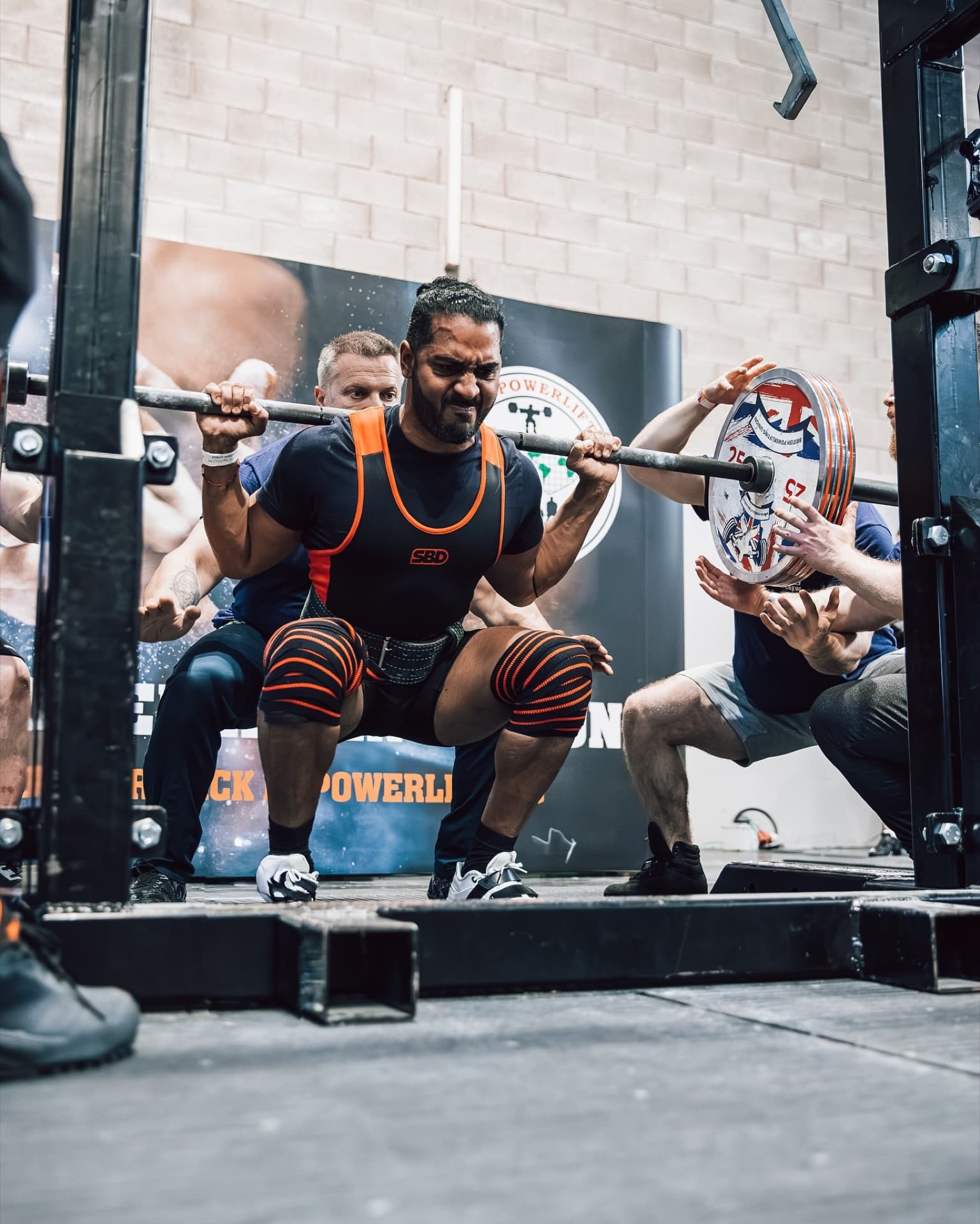 Cameron squatting heavy at competition